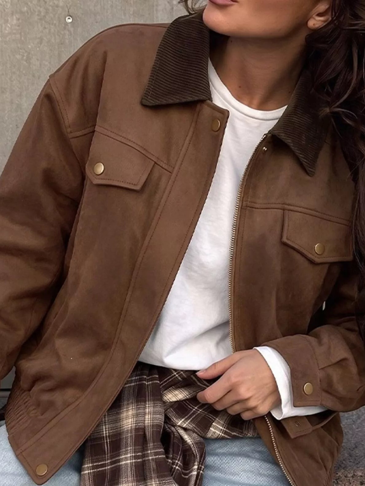 Brown zip-front jacket with stand collar and chest flap pockets