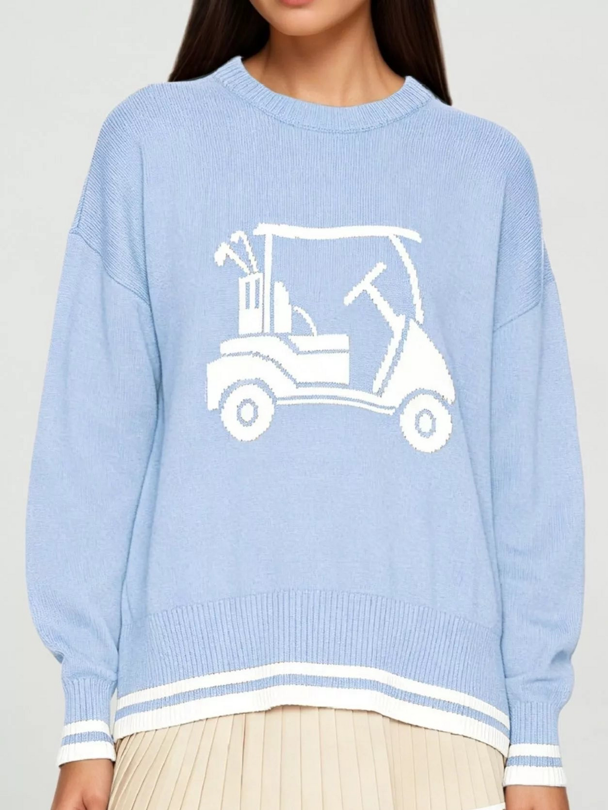 Light blue golf cart graphic dropped-shoulder sweater with white striped cuffs and hem