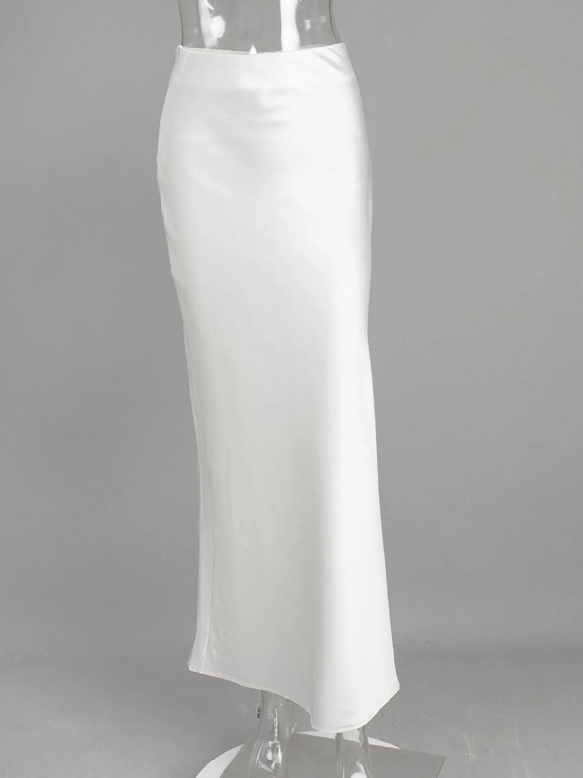 White high-waisted maxi skirt on clear mannequin, straight column silhouette and smooth finish.