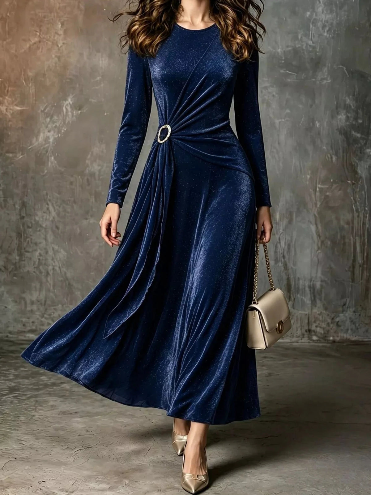 Dark blue velvet long-sleeve maxi dress with waist ring detail and draped A-line skirt