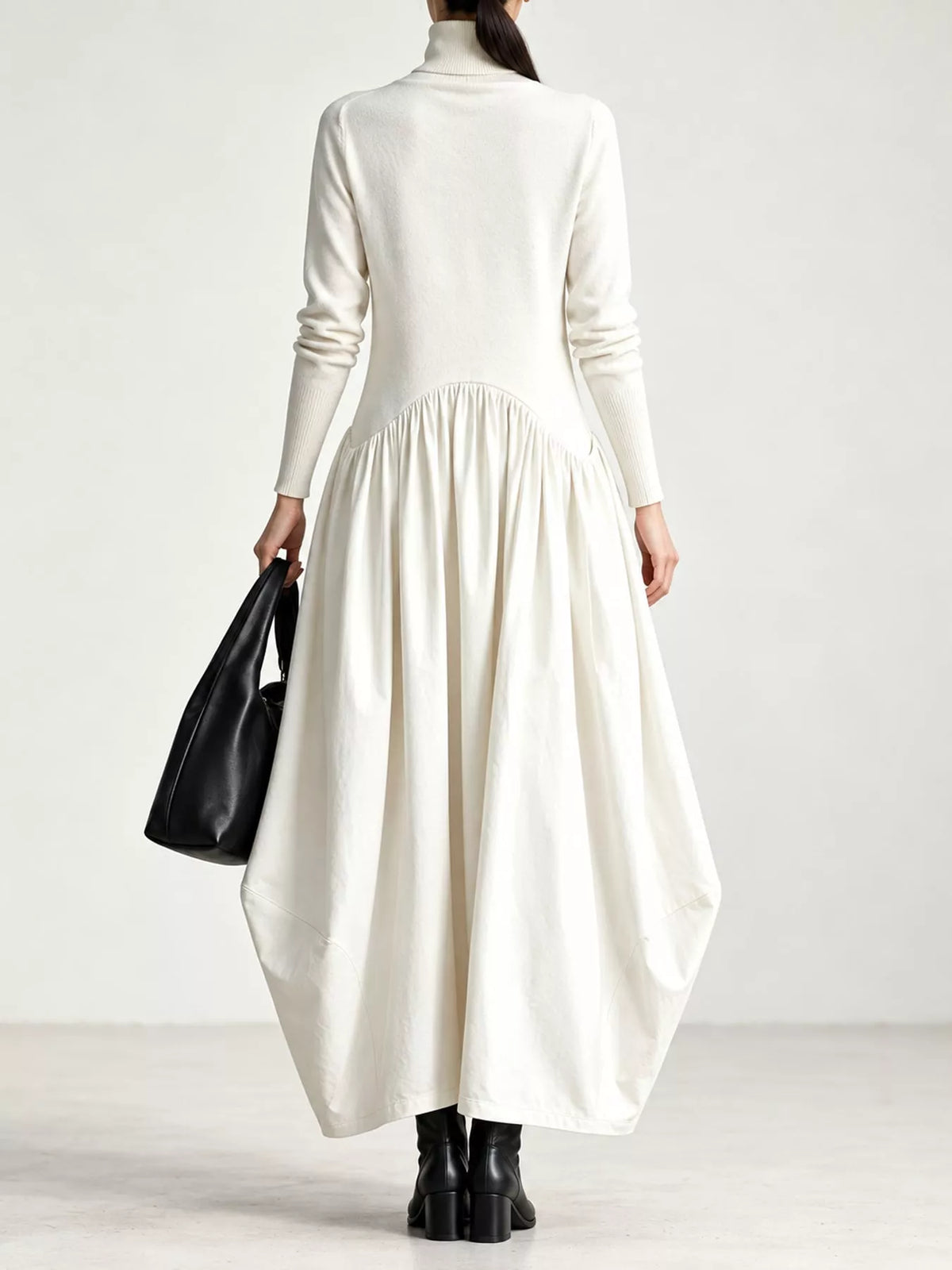 White turtleneck long-sleeve maxi dress with gathered waist and balloon-style skirt