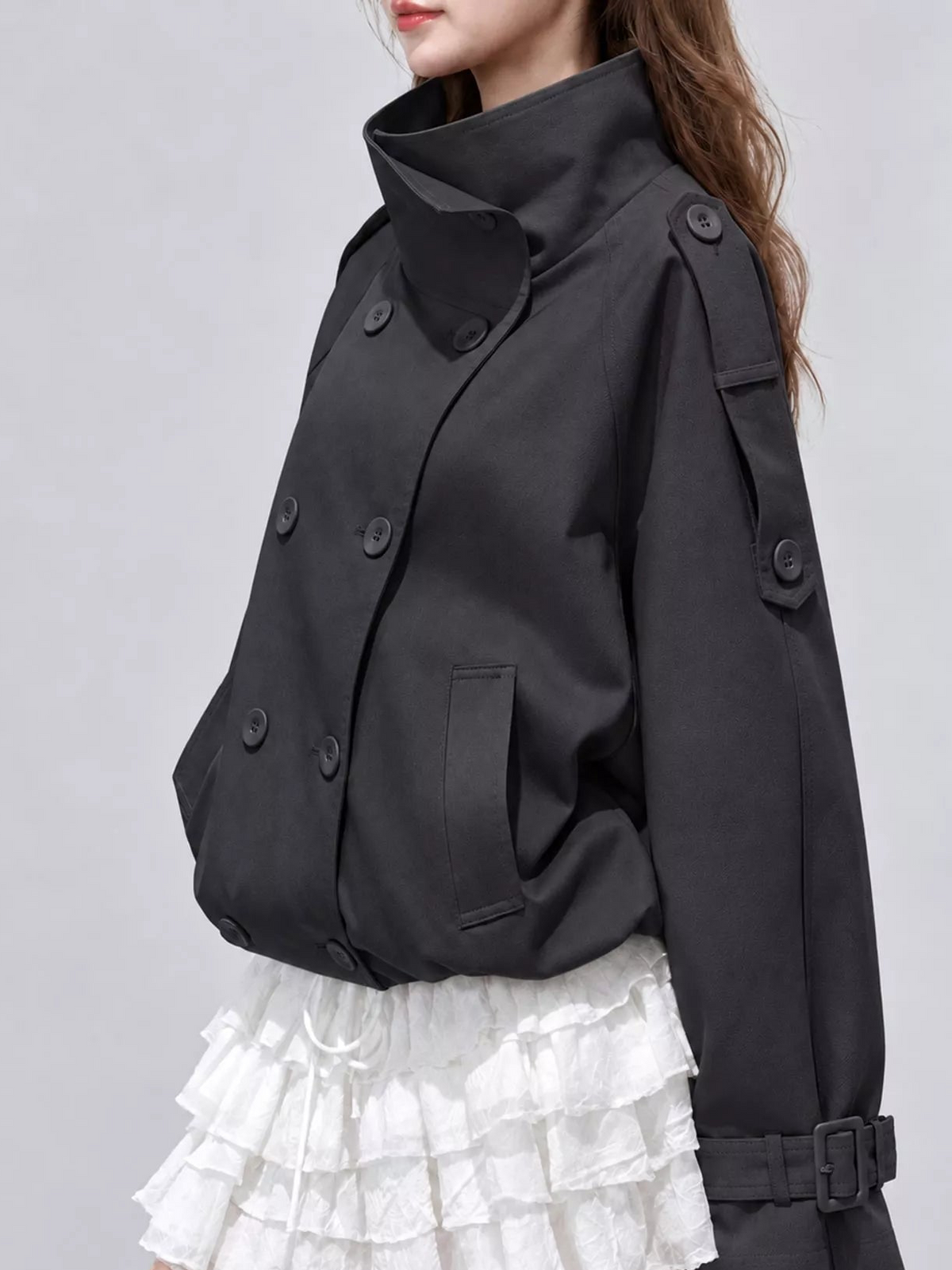 Black cropped double-breasted trench jacket with stand collar and side flap pockets