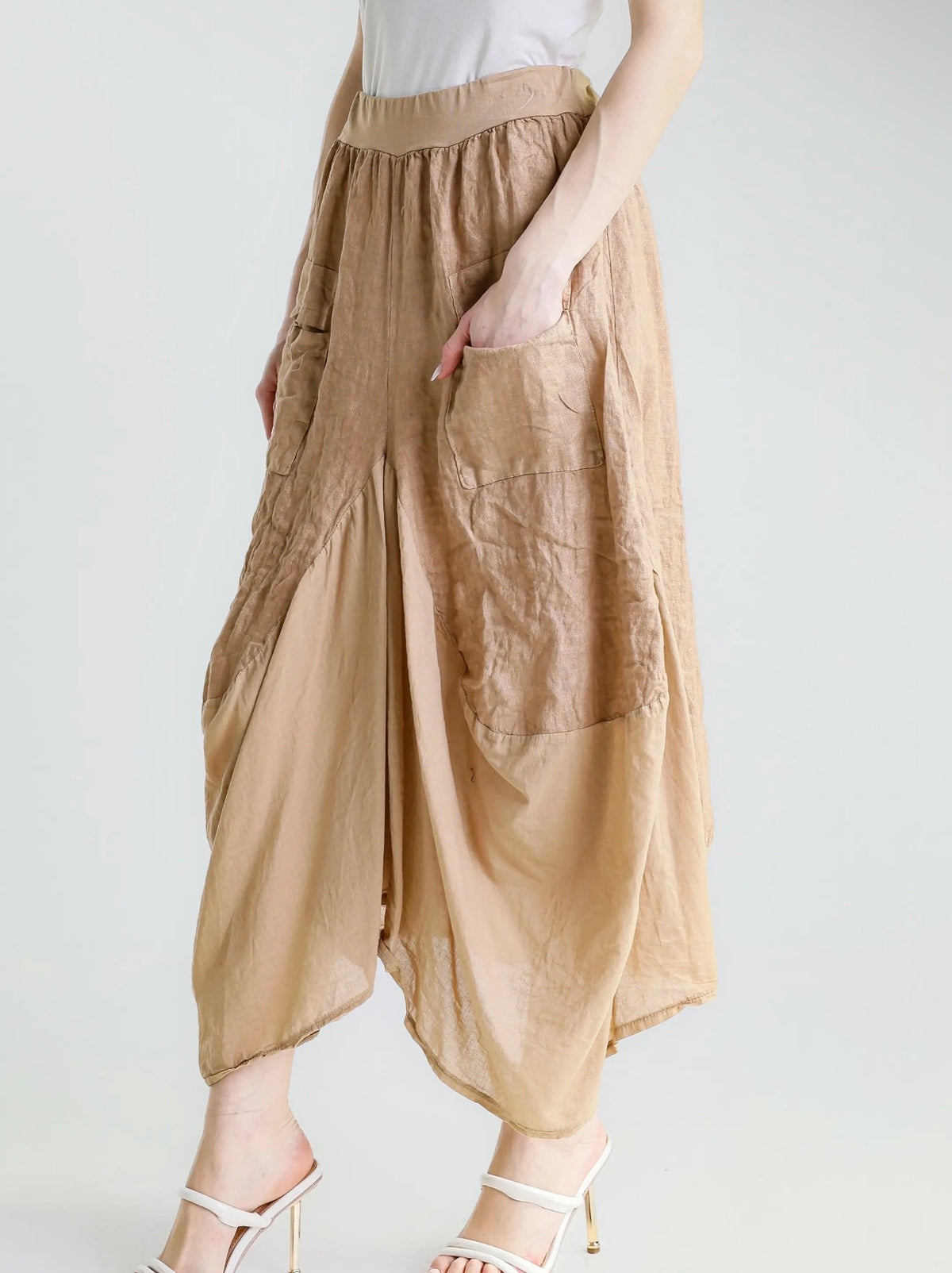 Camel linen-cotton skirt with elastic waistband, patch pockets, draped hem