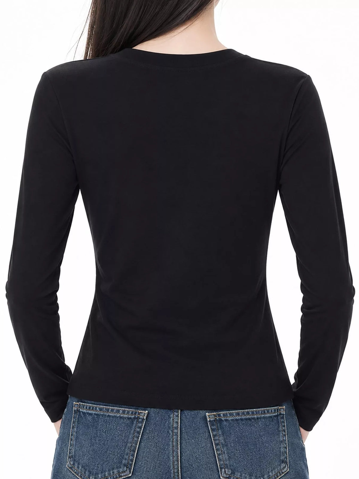 Black long sleeve crew neck T-shirt, back view with fitted waist silhouette.