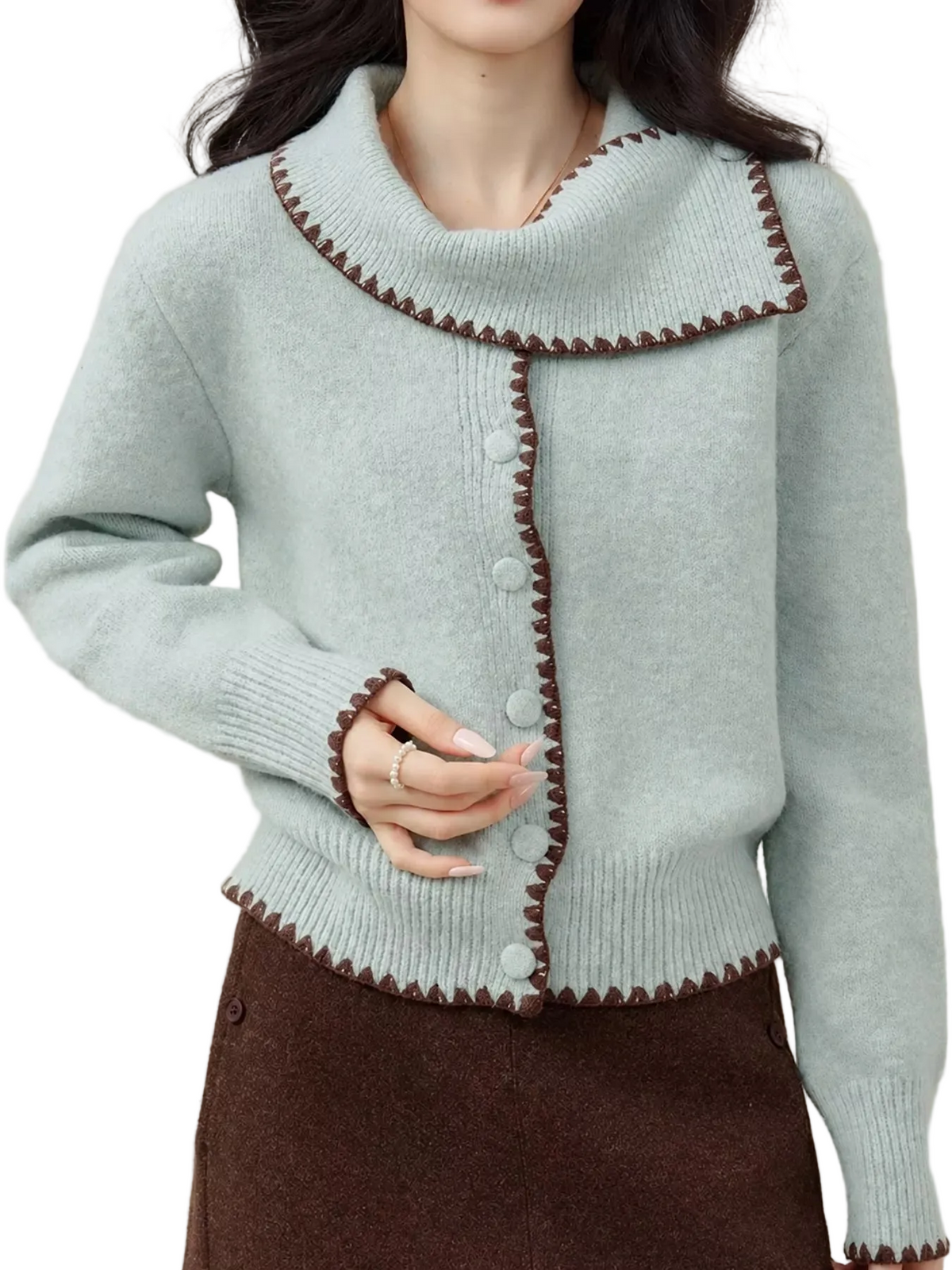 Pale blue cardigan with a scarf collar, brown contrast trim, buttons, and ribbed cuffs and hem
