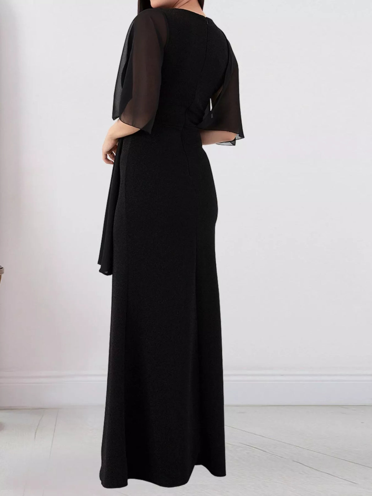 Black maxi dress with flutter sleeves and back view, side drape and slit