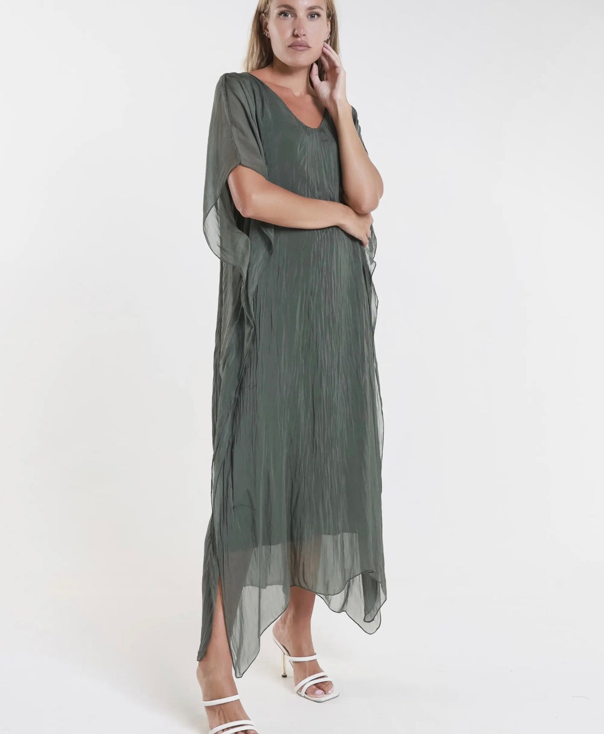 Army green silk kaftan dress with V-neck, relaxed fit, and layered sheer hem