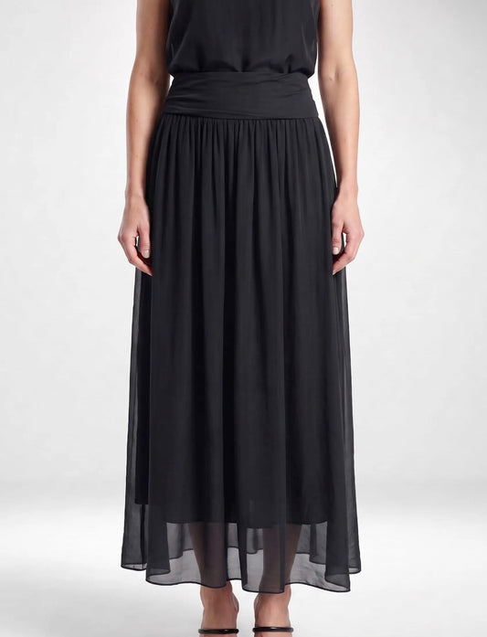 Black foldover waist pleated maxi skirt with gathered tiers and sheer hem