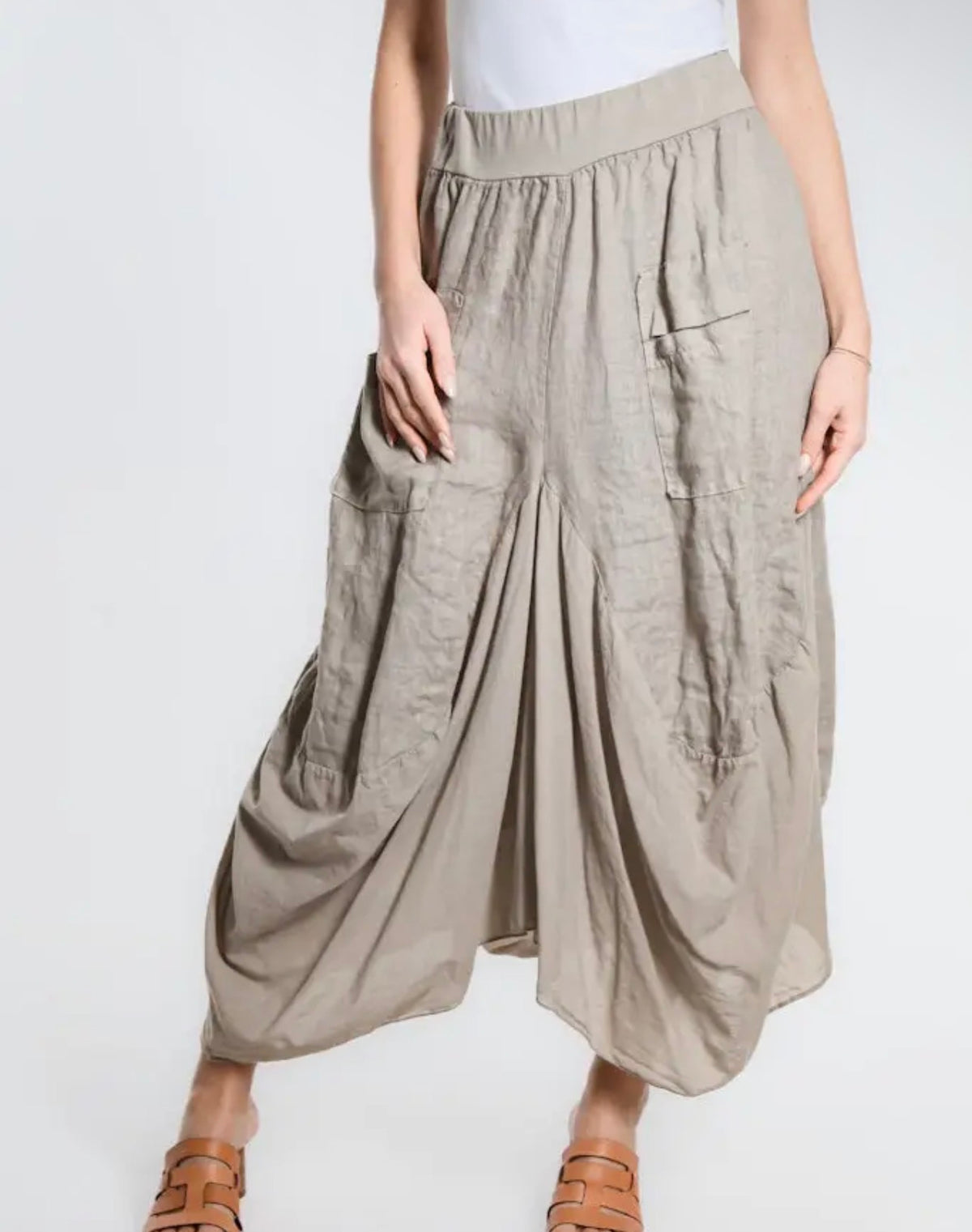 Taupe linen-cotton skirt with gathered front, elastic waistband, and patch pockets