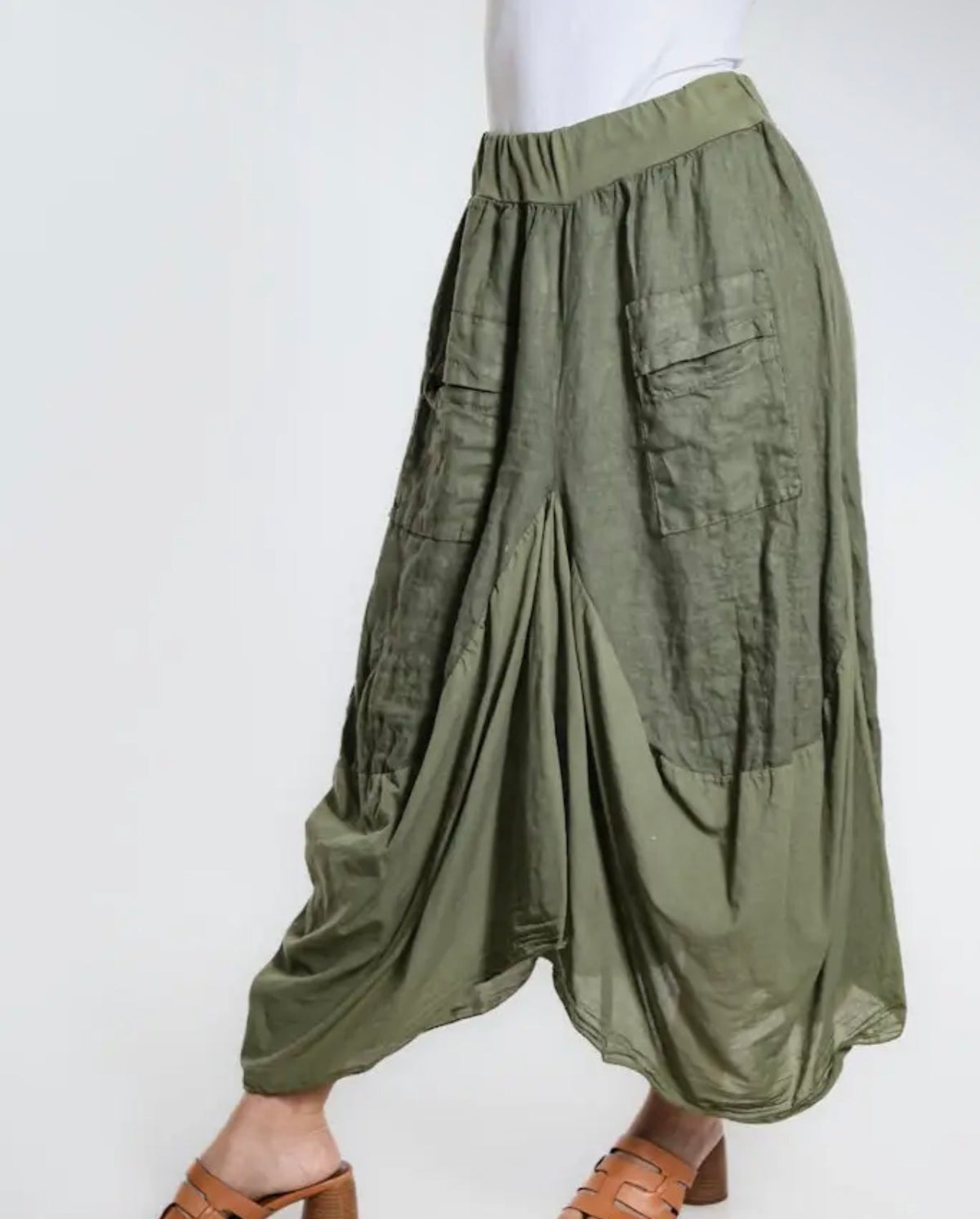 Army green bunched skirt back view, elastic waist, patch pockets, draped hem