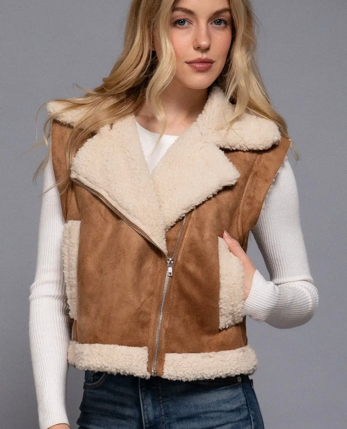 Faux suede inner-fur zip-up vest with cream fleece trim and front zipper, tan brown