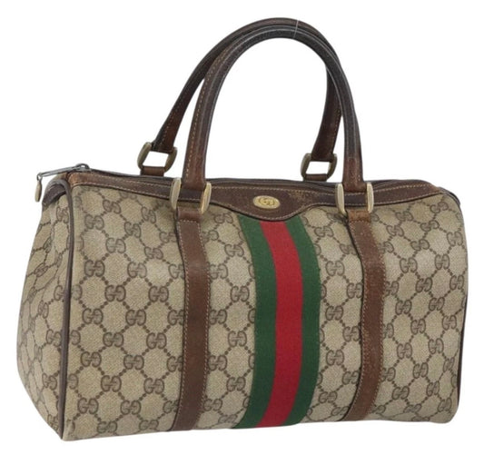Vintage Gucci GG Supreme canvas handbag with multicolor web stripe and brown leather trim