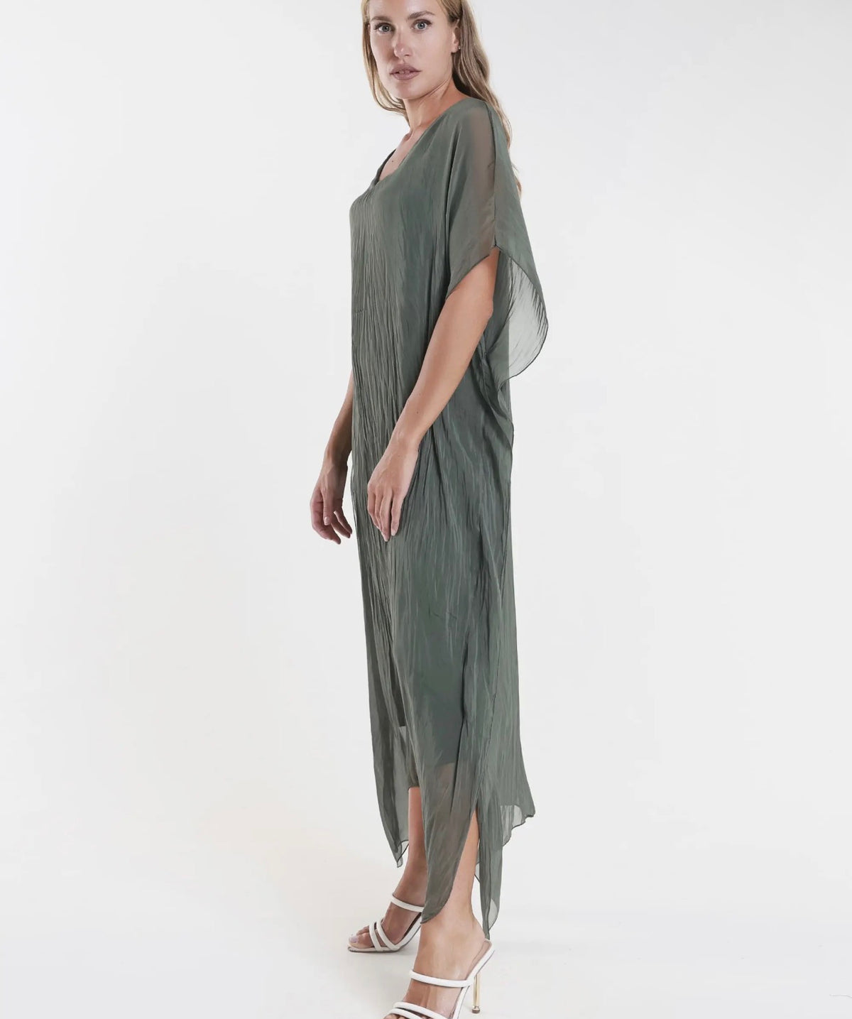 Army green silk kaftan dress with V-neck, flowing silhouette, and sheer side hem