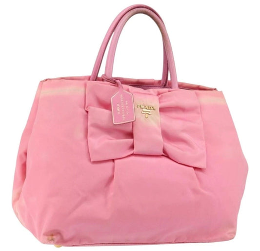 PRADA pink nylon tote handbag with front bow and top handles
