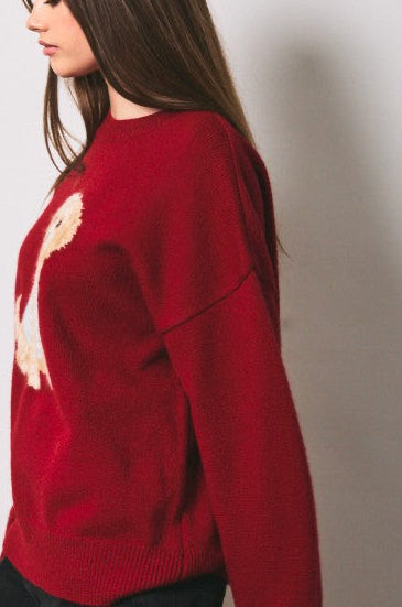 Red knit sweater with golden doodle graphic and ribbed cuffs