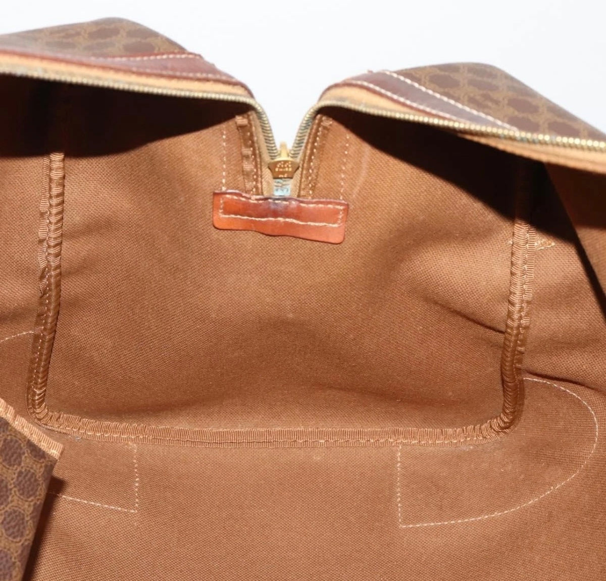 CELINE Boston bag interior showing brown lining and stitched seams