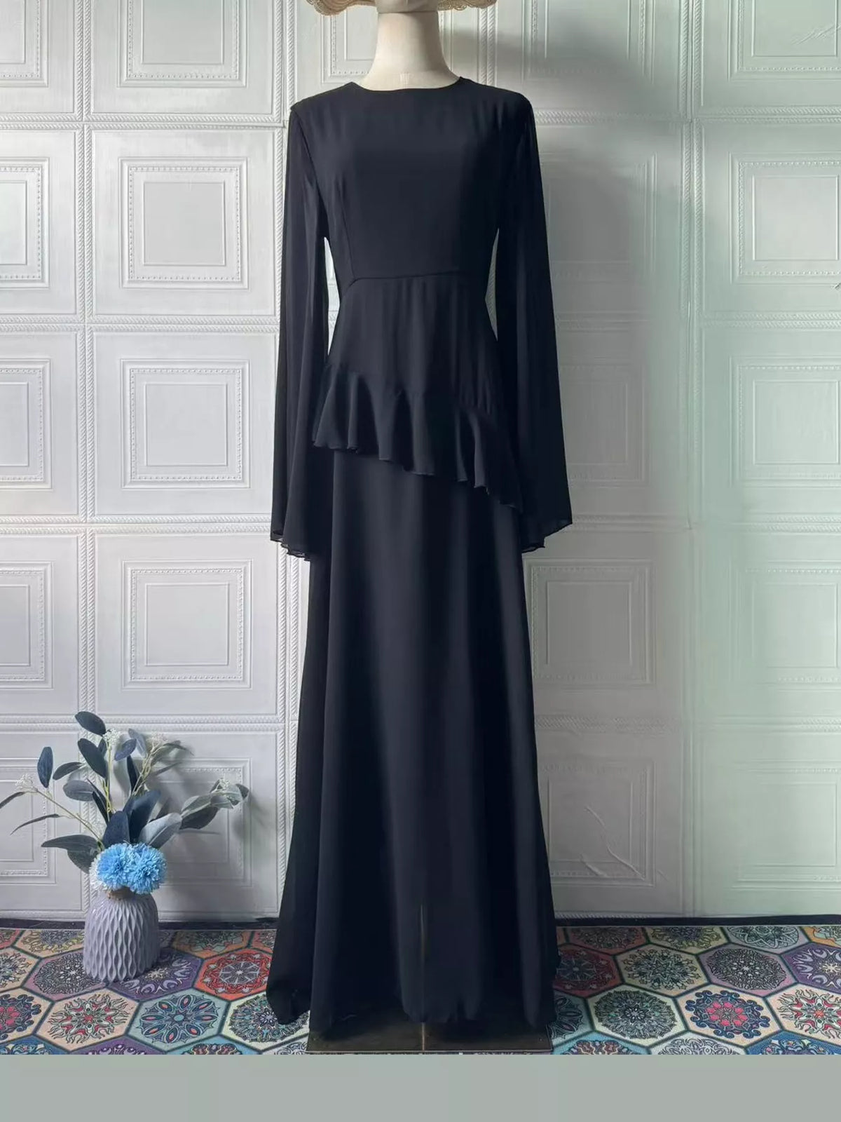 Plus size ruffled flare sleeve maxi dress in black, front view with tiered ruffle hem