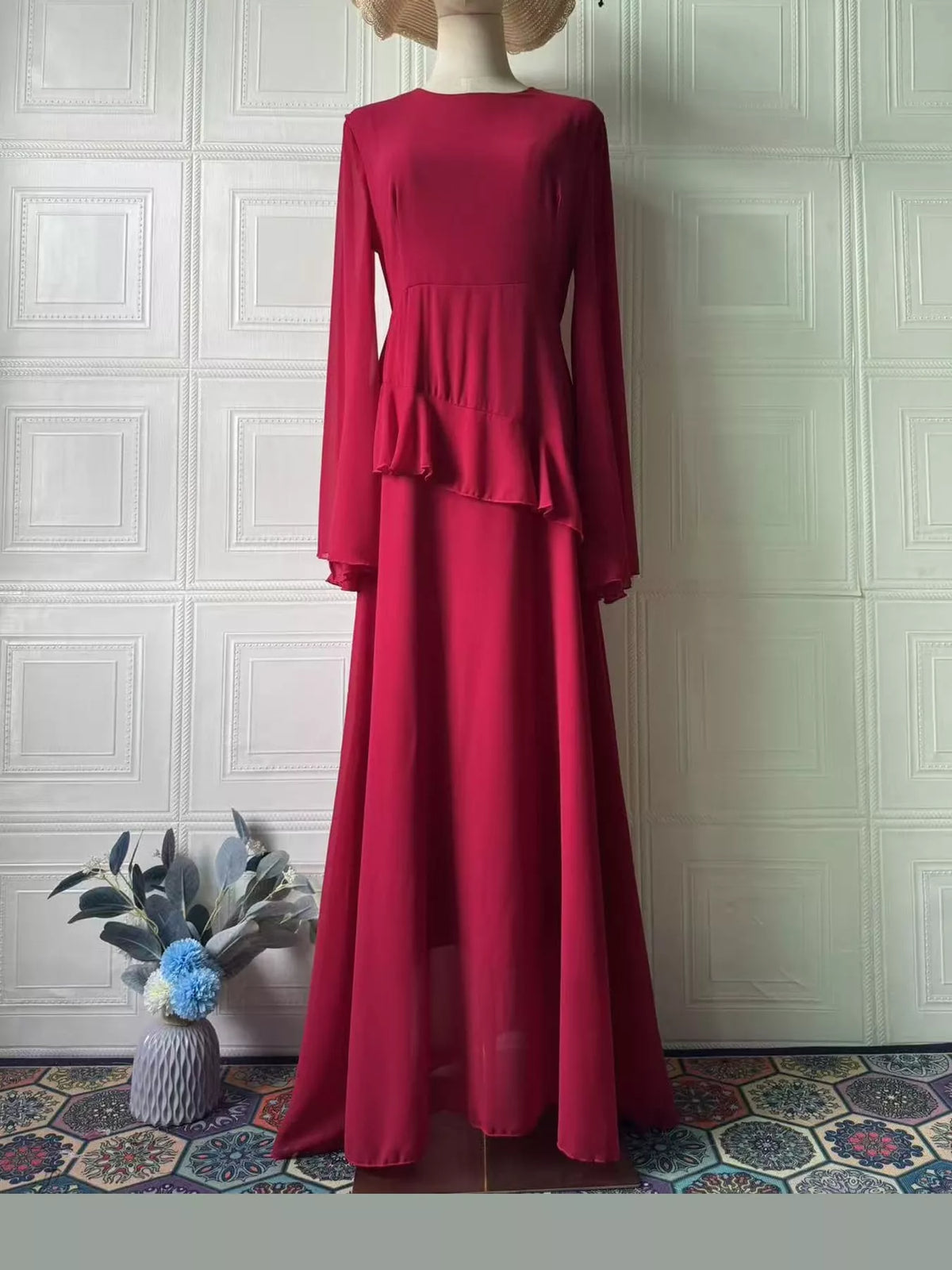 Burgundy plus-size maxi dress with long sleeves and tiered waist peplum detail