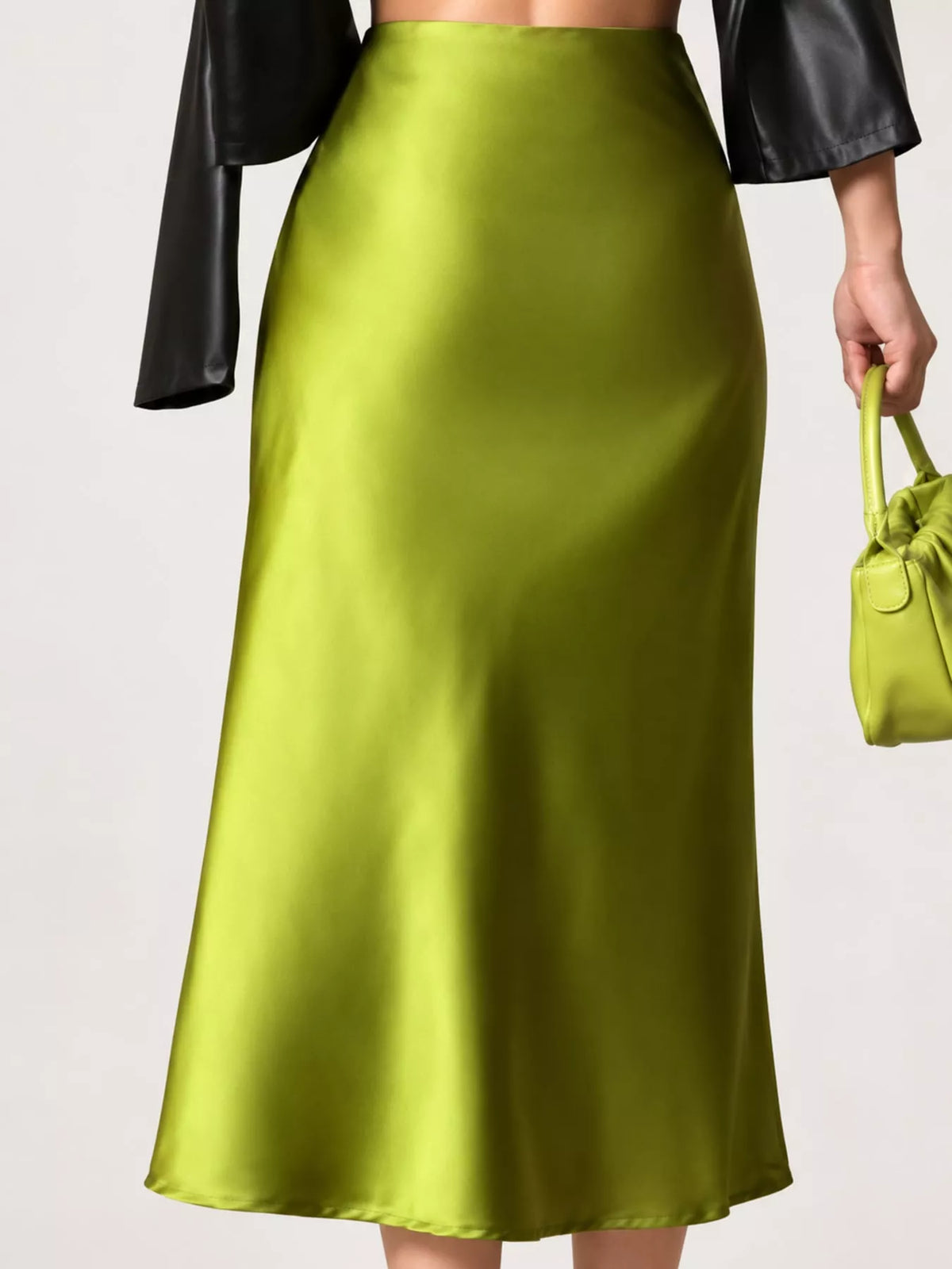 High-waisted satin midi skirt in lime green with satin sheen and A-line shape