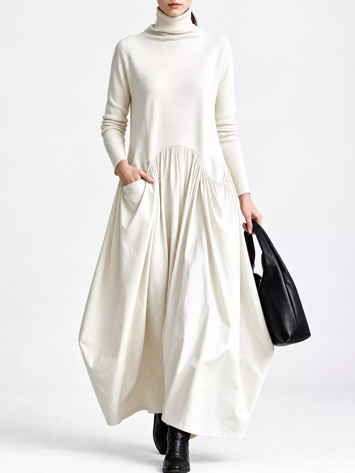 White turtleneck long-sleeve maxi dress with gathered waist and full draped skirt