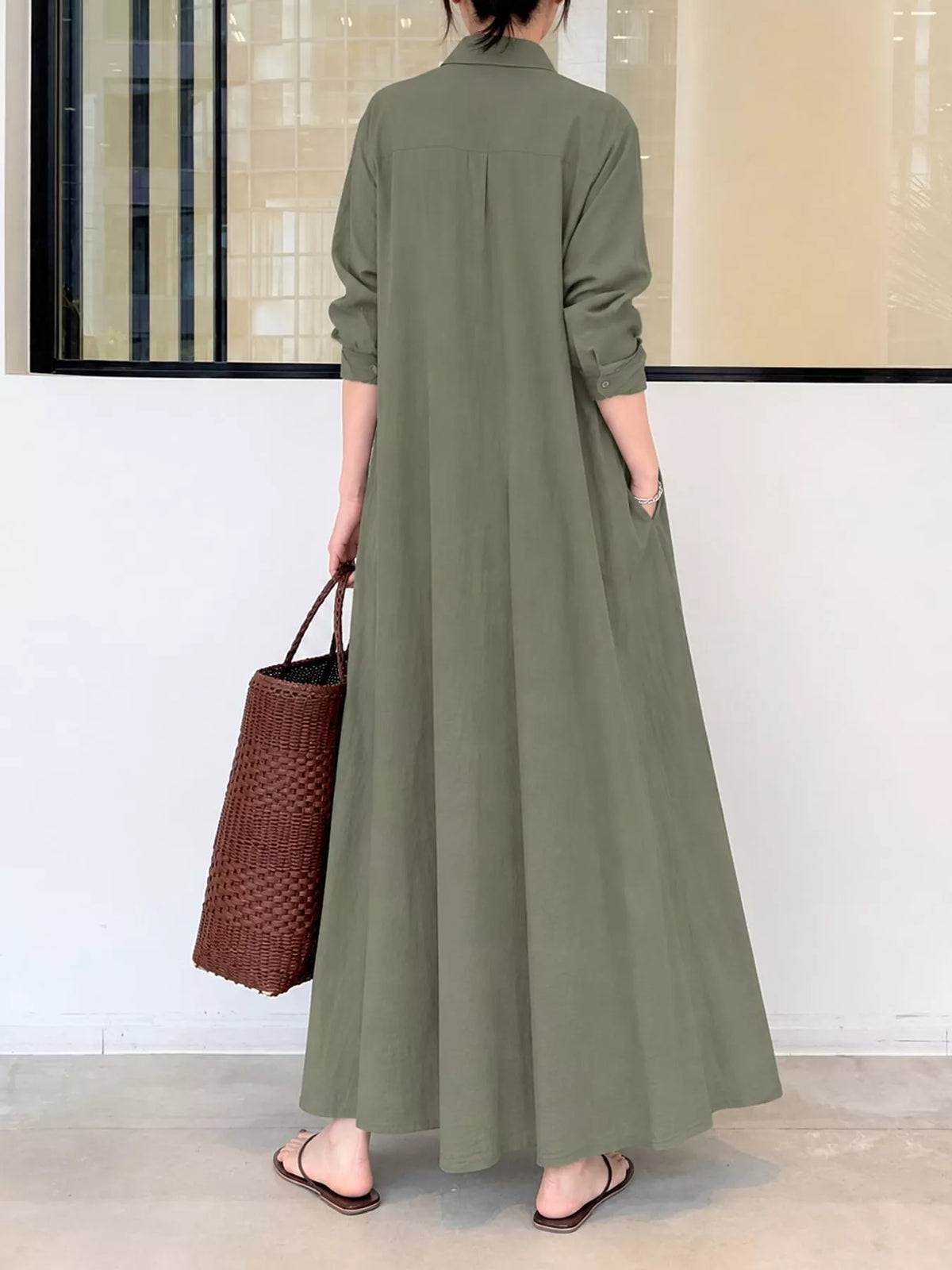 Back view olive green button-front maxi shirt dress with full-length skirt