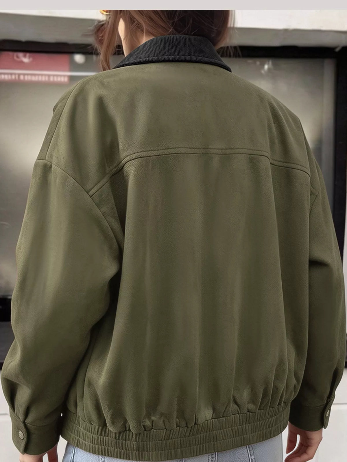 Army green zip-up dropped shoulder jacket with dark collar and ribbed hem