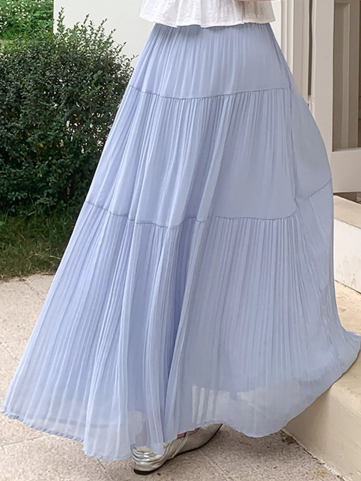 Light blue tiered pleated high-waist maxi skirt with flowing layers