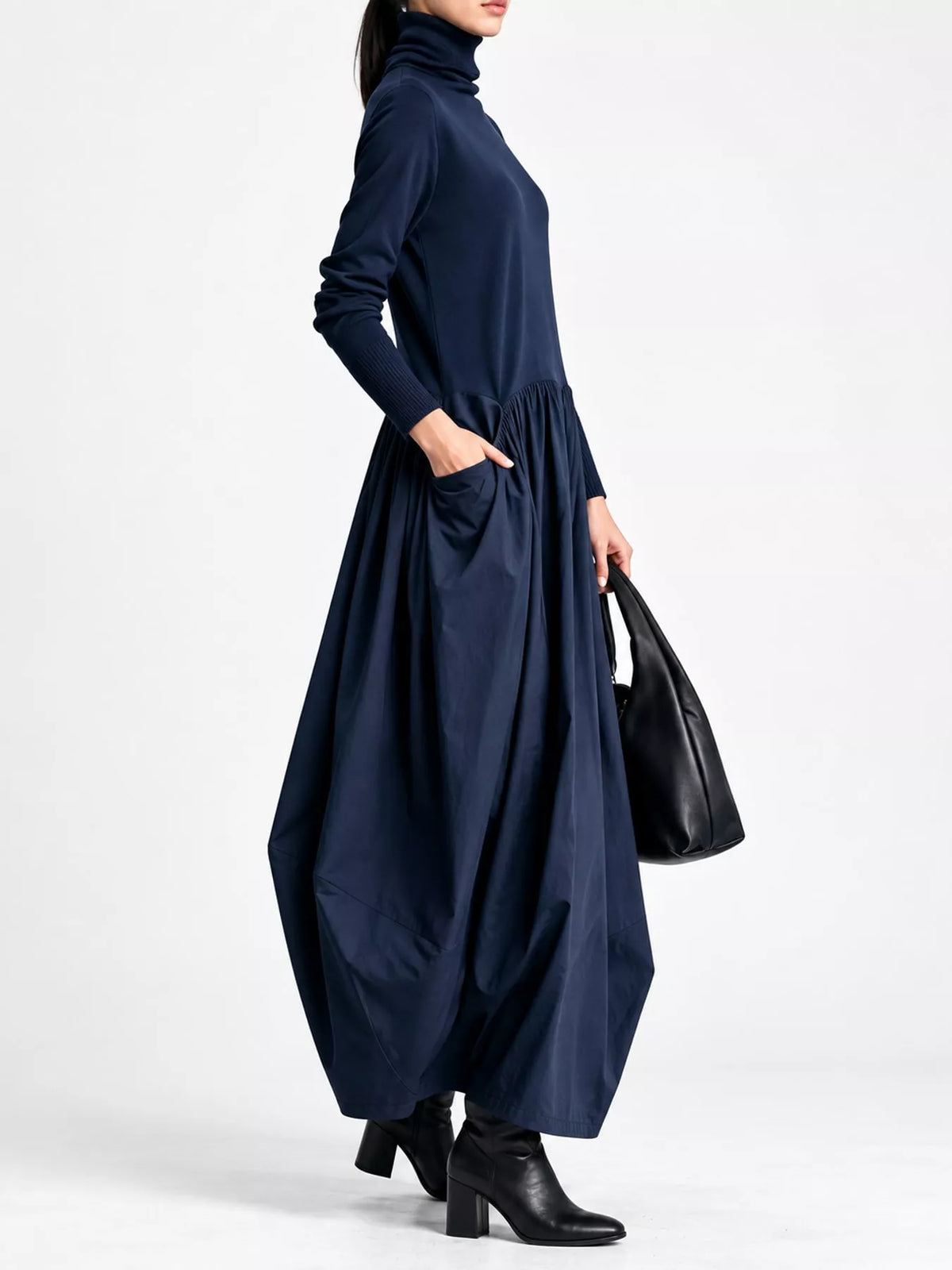Navy blue turtleneck long-sleeve maxi dress with gathered waist, full skirt, side pocket