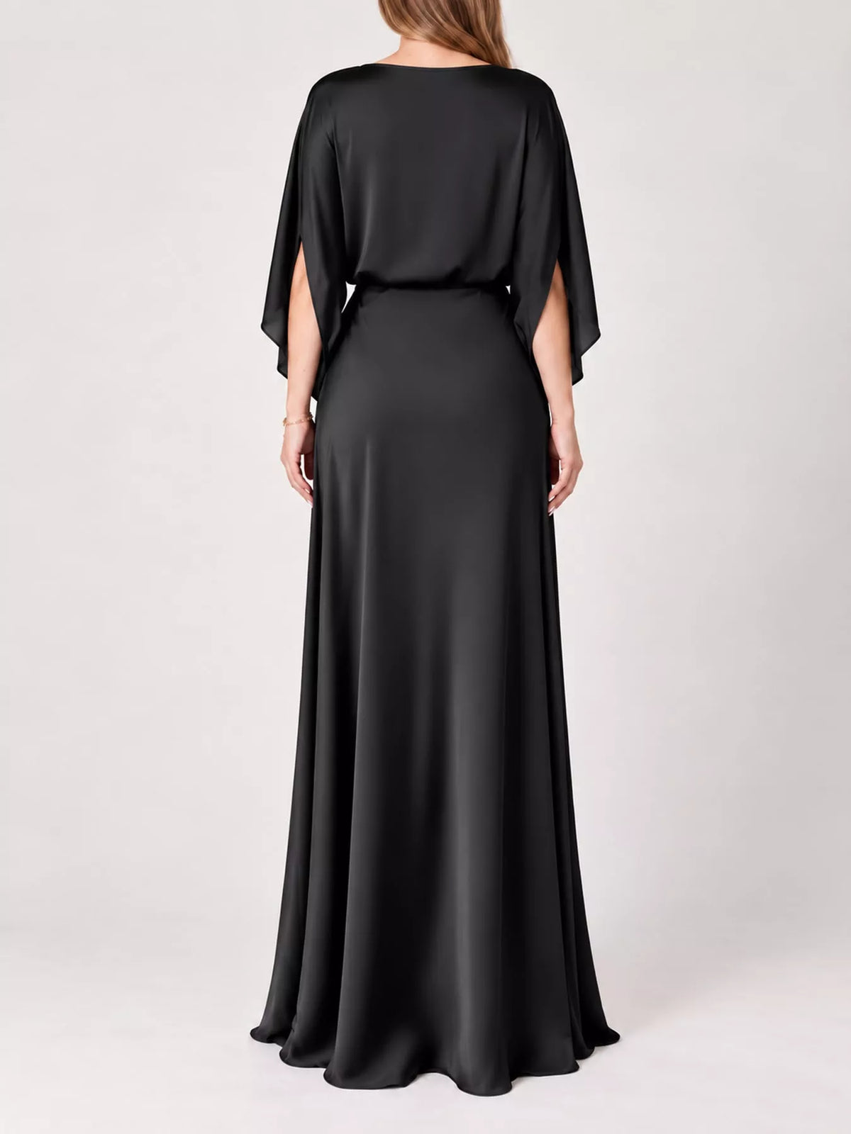Black satin maxi dress with draped cape sleeves and smooth back skirt