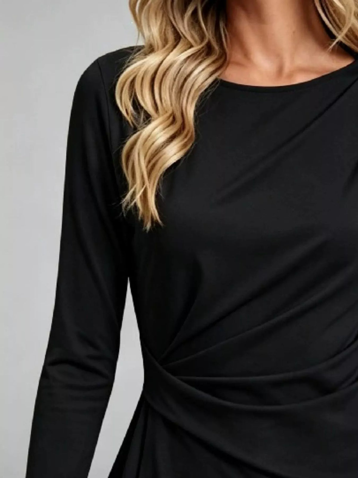 Black long-sleeve ruched-waist t-shirt with V-style front drape