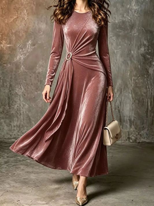 Pink velvet long-sleeve maxi dress with waist ring detail and draped A-line skirt