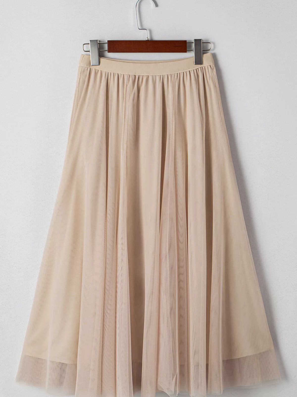 Dust Storm tulle skirt hanging flat, showing its gathered waist and flared shape