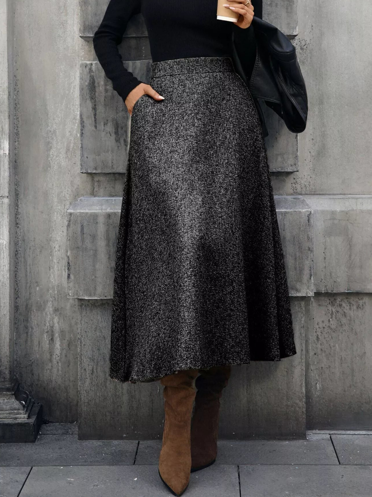 Front view of a gray flecked A-line midi skirt with a smooth waistband