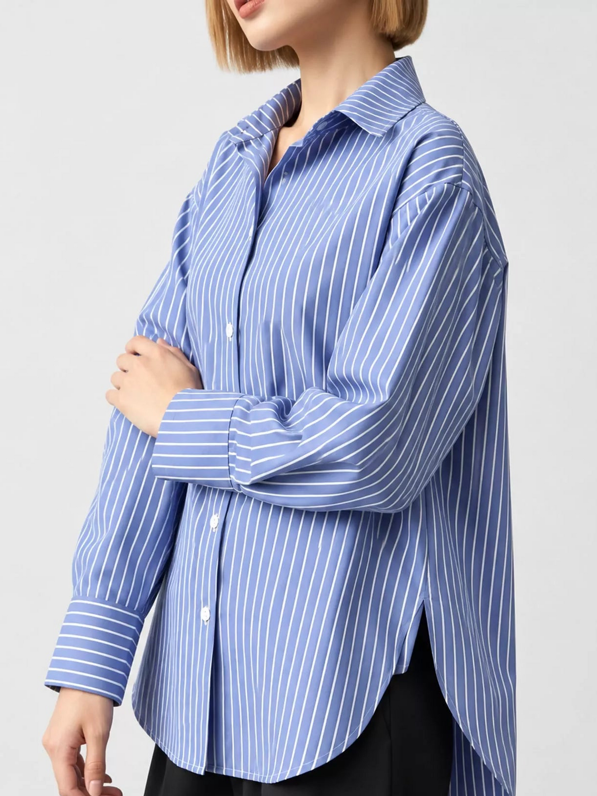 Light blue and white striped long-sleeve button-up shirt with pointed collar