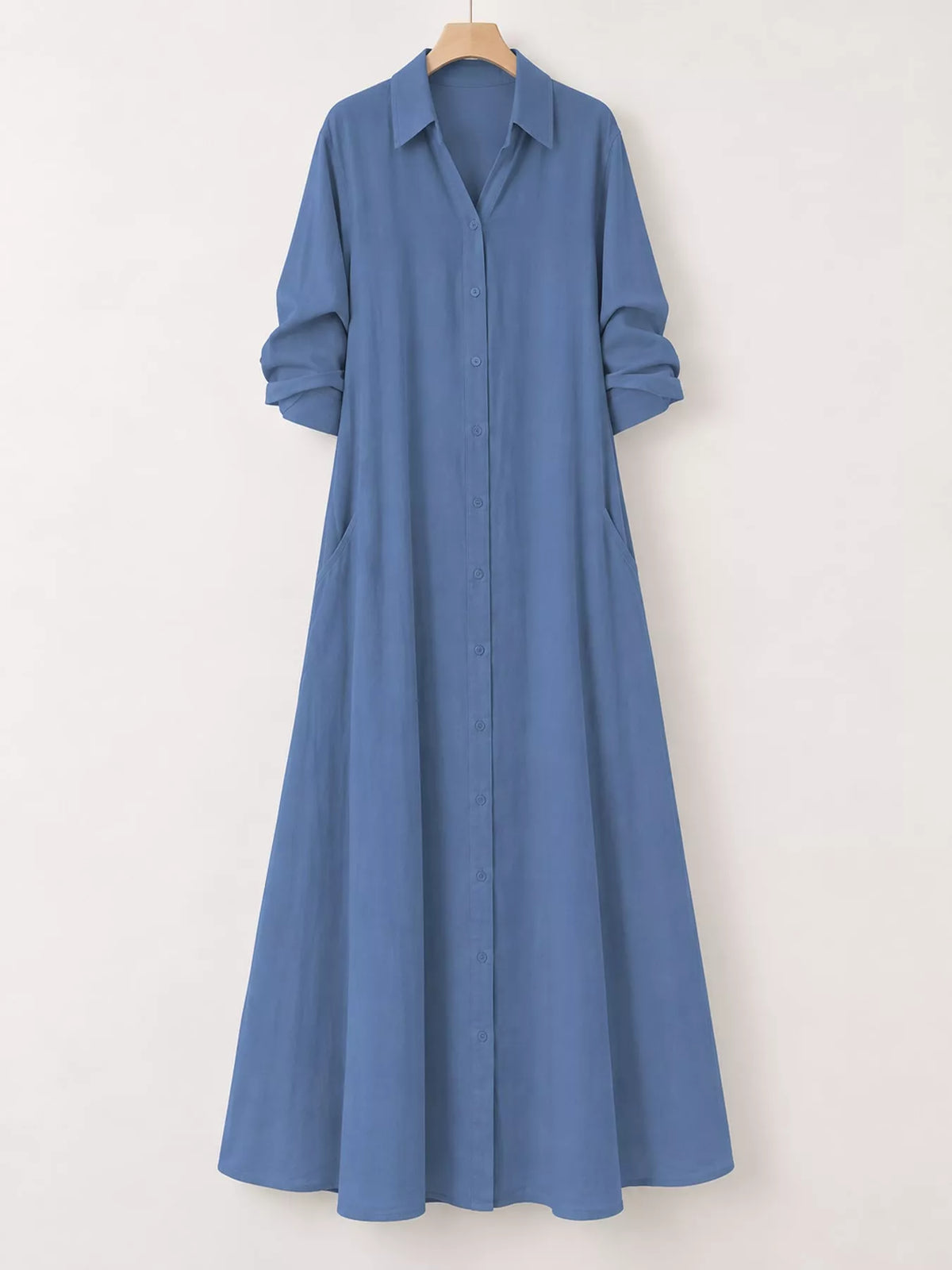 Light blue button-front long sleeve maxi shirt dress on a hanger