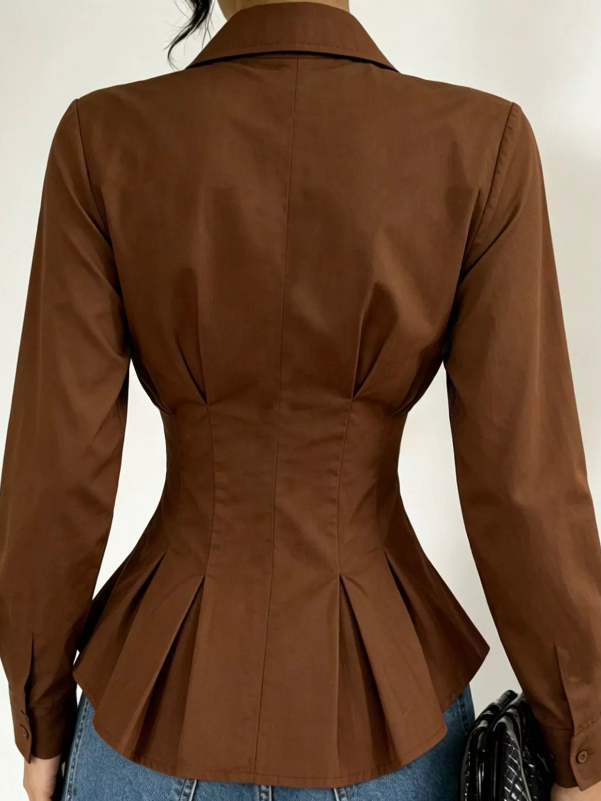 Dark brown button-down peplum blouse, long sleeves, back view with pleated peplum