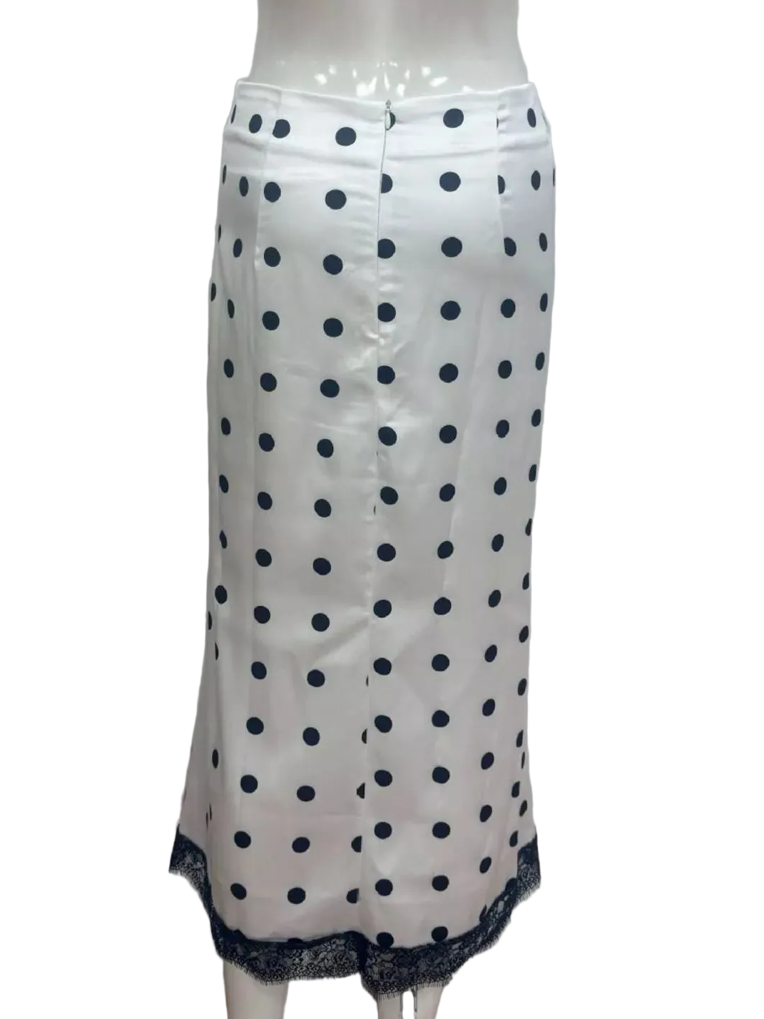 Back view of the white skirt showing its waistband, seam, and lace trim.