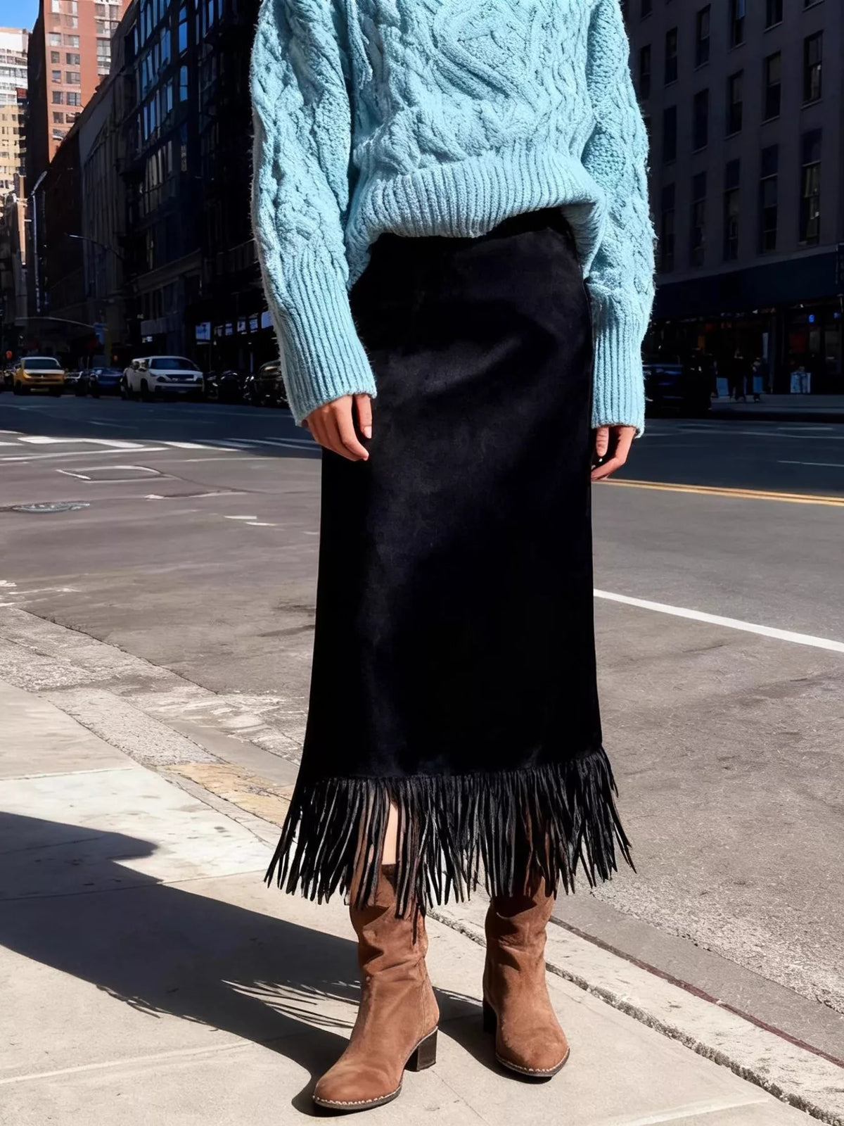 Black suede high-waisted midi skirt with fringe hem