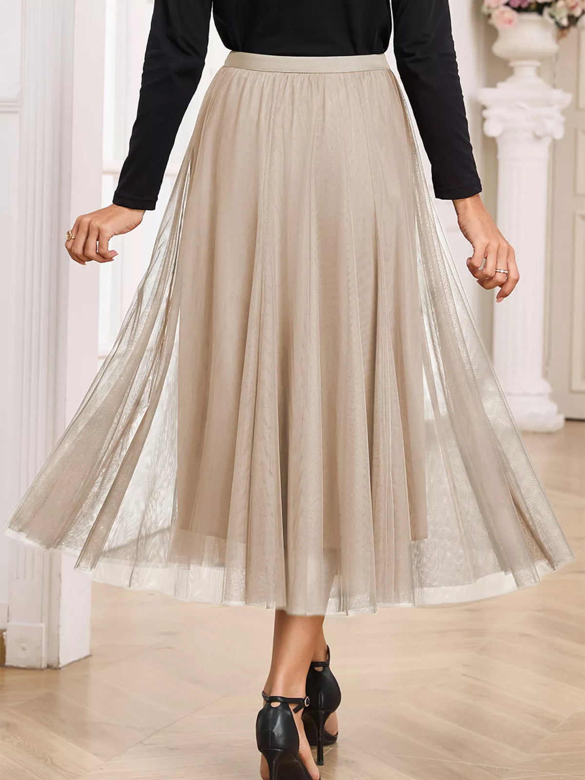 Dust Storm mesh overlay skirt with a full, flowing silhouette