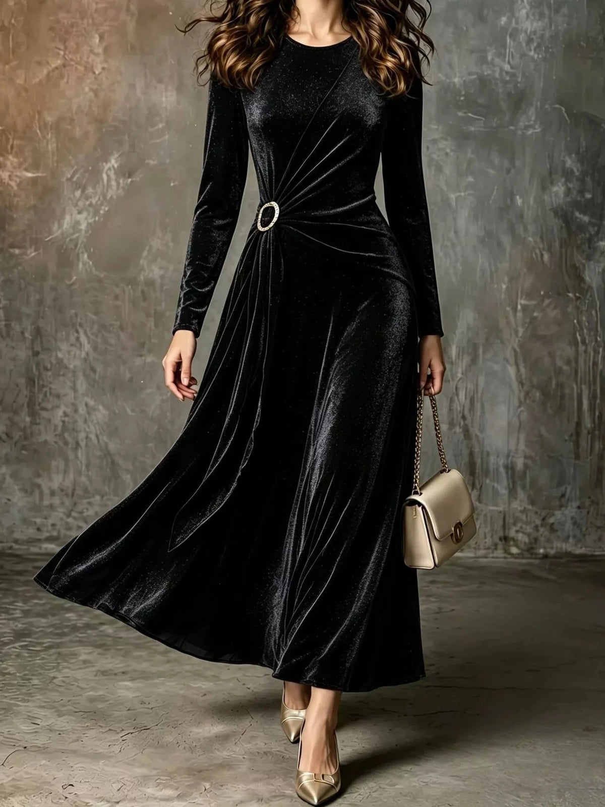 Black velvet long-sleeve maxi dress with waist ring detail and draped A-line skirt