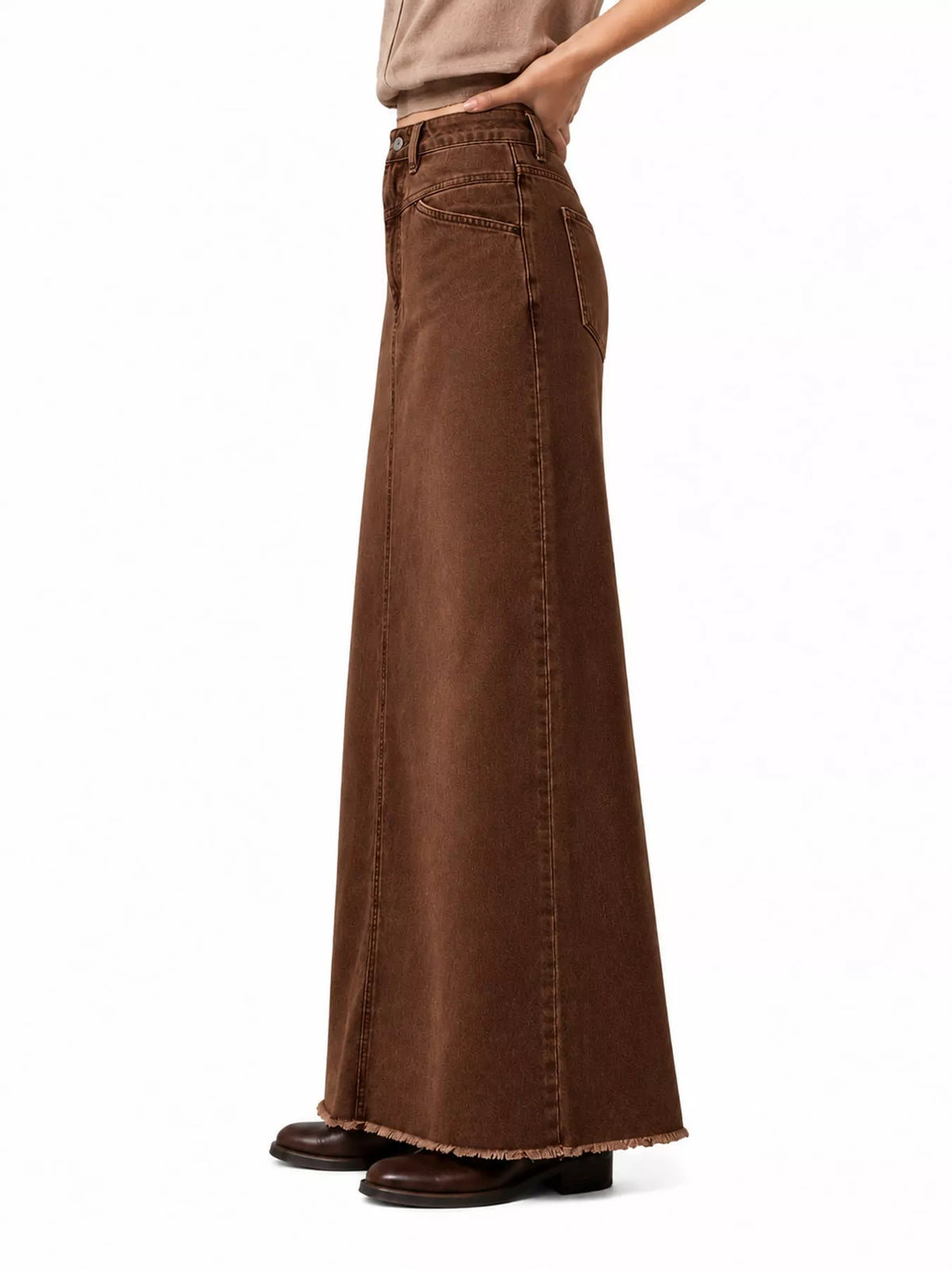 Coffee brown denim maxi skirt with long straight fit, button front, and visible seams.