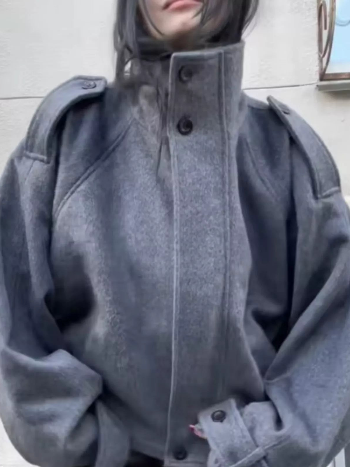Heather gray stand-collar zip-up jacket, front view with snap buttons and side seams.