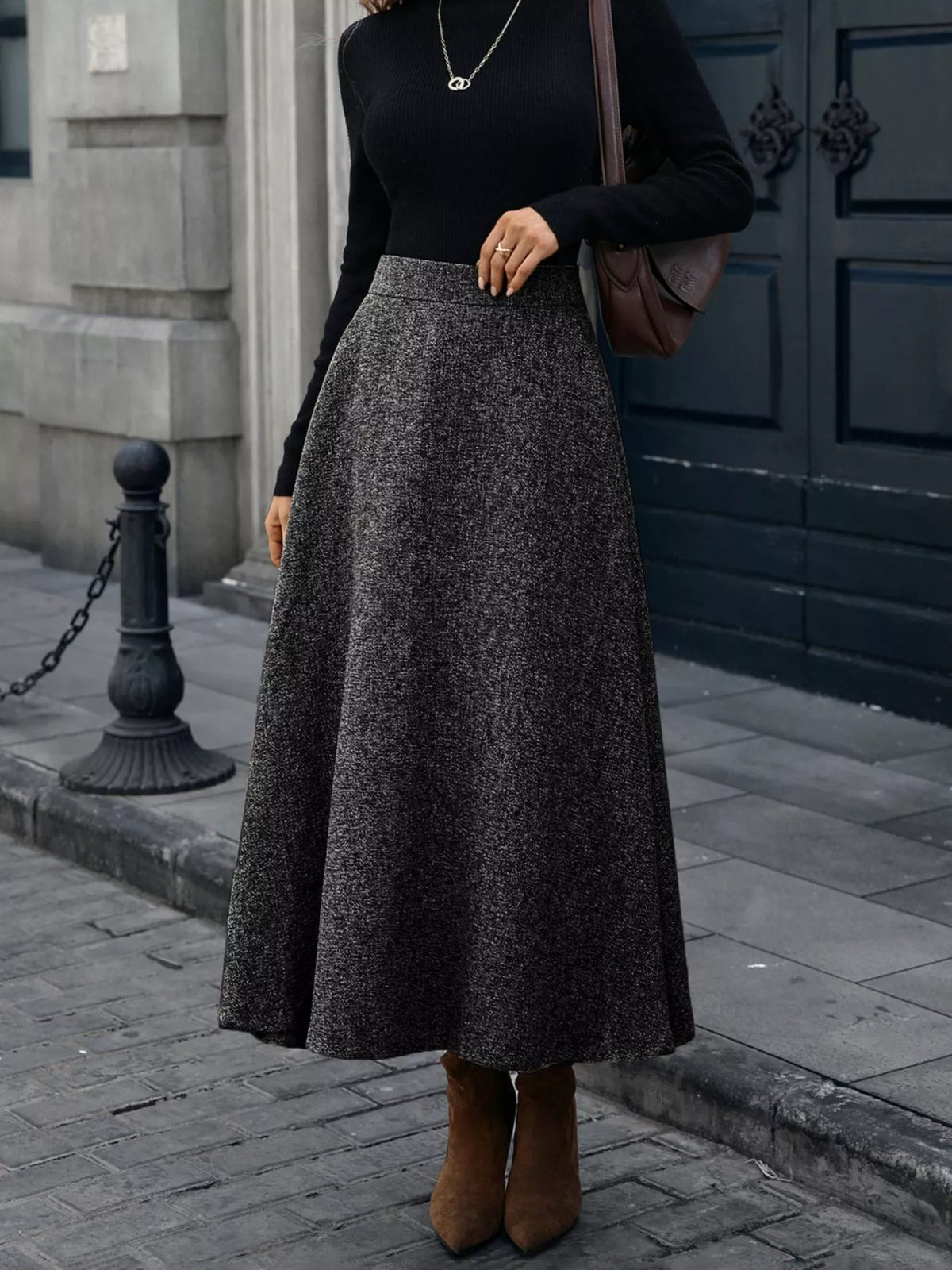 Gray flecked A-line midi skirt with a long, full silhouette