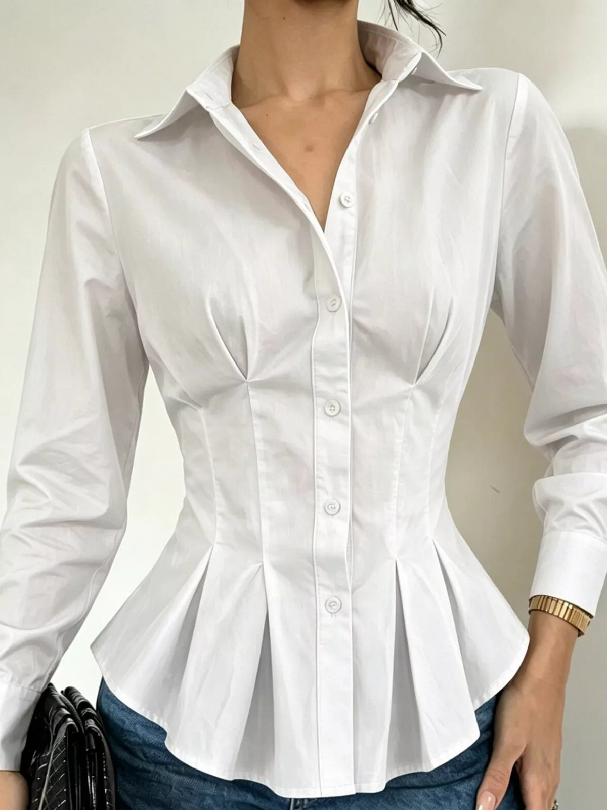 White button-down peplum blouse with fitted waist, long sleeves, front view
