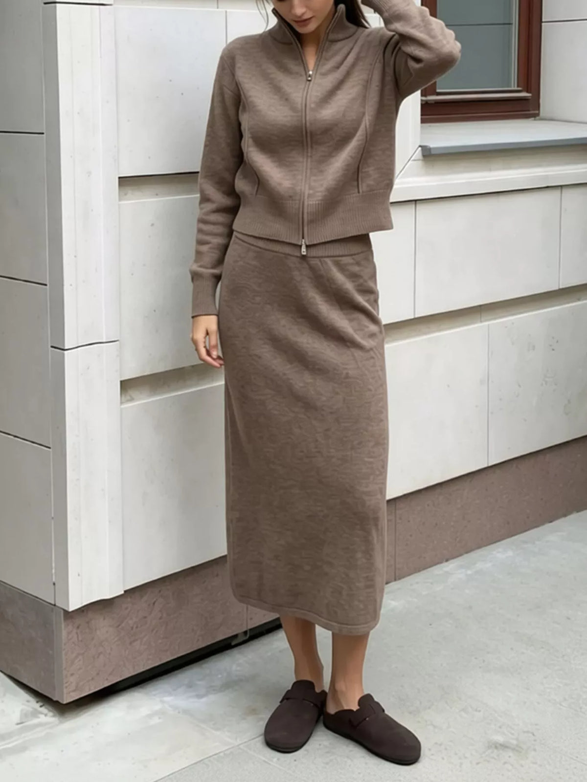 Taupe cardigan and midi skirt set, shown with the cardigan zipped