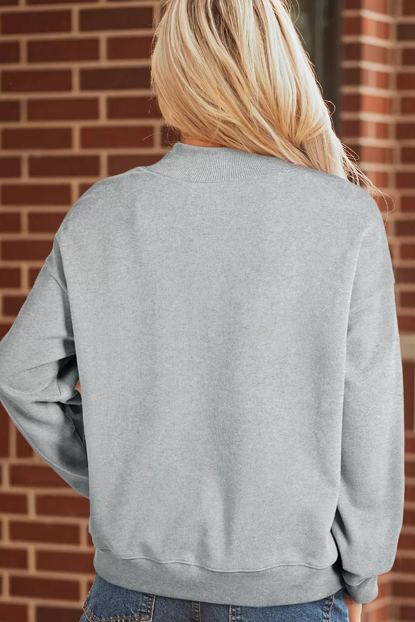 Gray mock-neck sweatshirt back view with plain design and ribbed hem