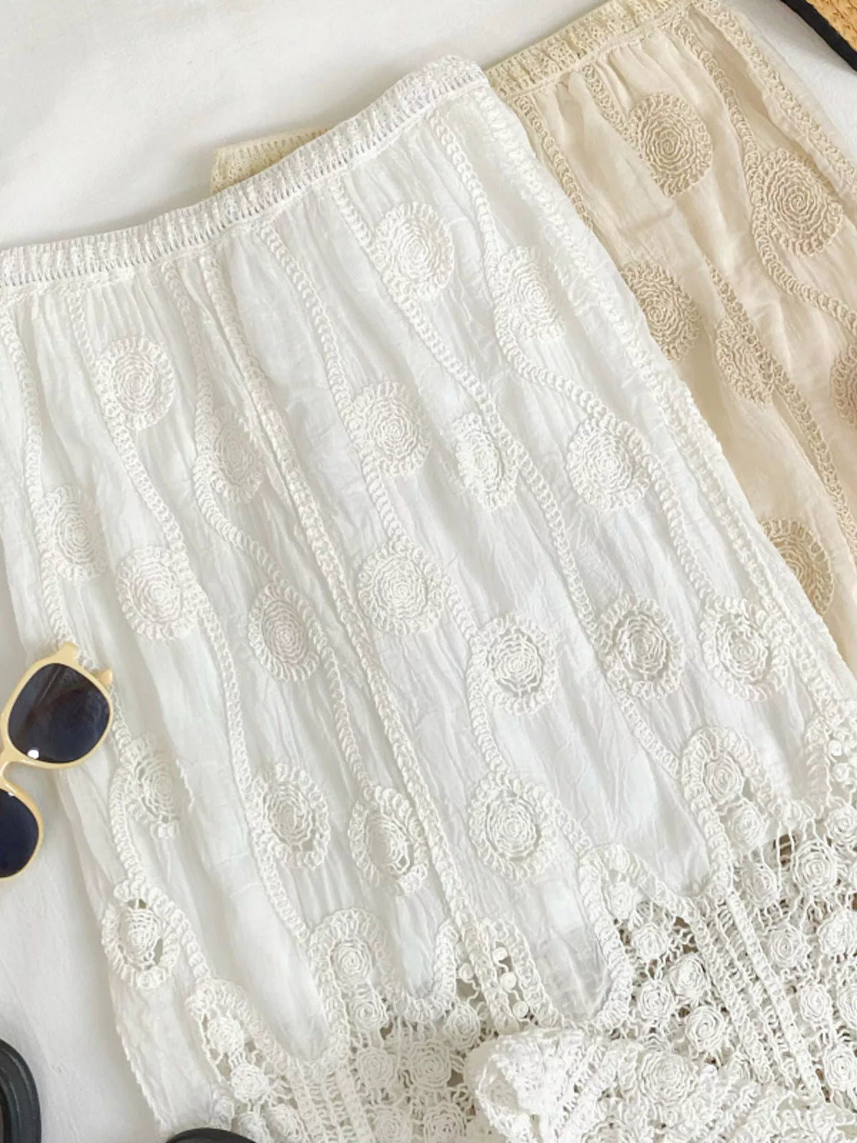 White lace skirt with elastic waist, embroidered medallions and openwork hem
