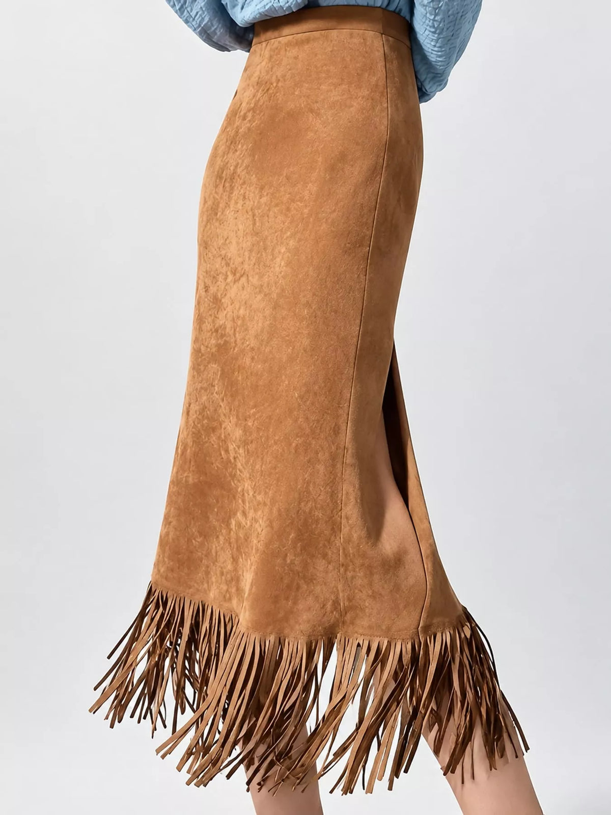 Light brown high-waisted midi skirt with a side slit and long fringe hem