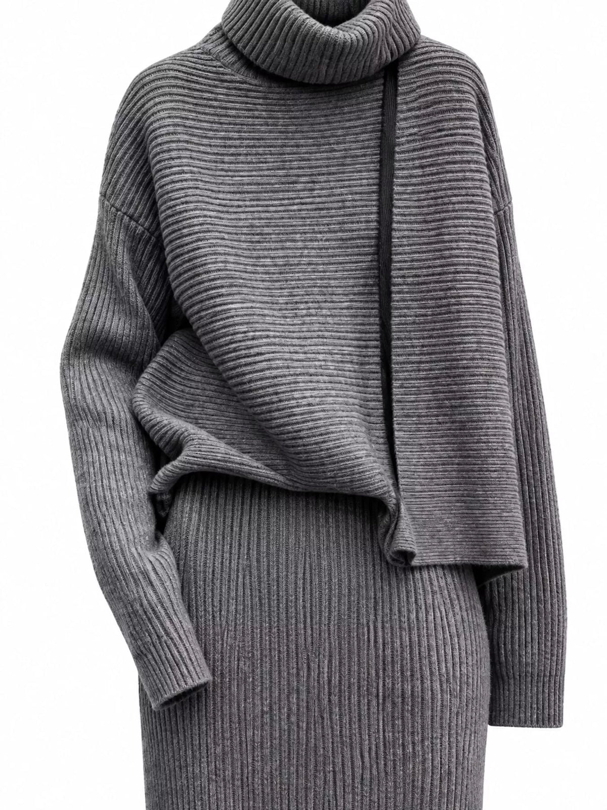 Close view of gray ribbed sweater and matching skirt set