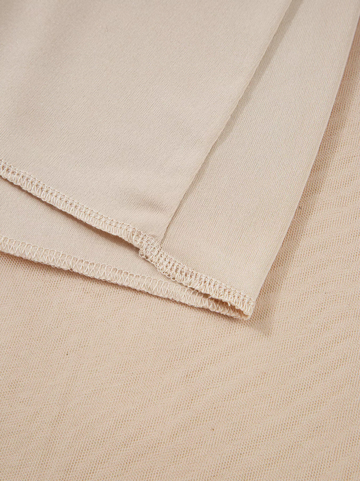Dust Storm skirt lining close-up with a neatly finished stitched hem